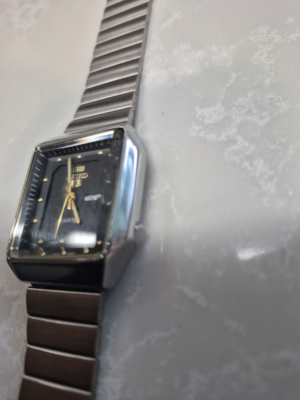 Seiko 5 Men’s Silver Stainless Steel Quartz Watch with Black Dial